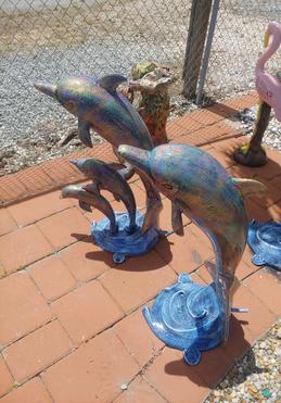 dolphin statues