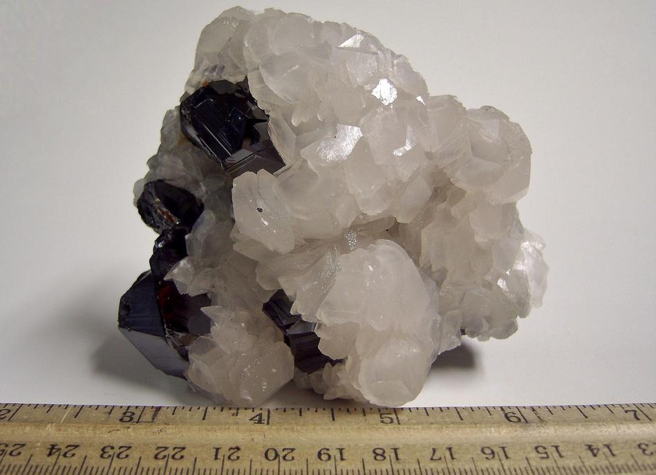 fluorescent CALCITE, SPHALERITE, PYRITE, Trepča Stan Terg Mine (Stari Trg Mine; Trepča Mine; Stan Trg Mine), Trepča complex, Trepča valley, Kosovska Mitrovica, District of Kosovska Mitrovica, Kosovo - for sale