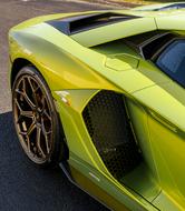 A yellow car that has auto ceramic coating near Norwood, MA from ACP Paint Protection.