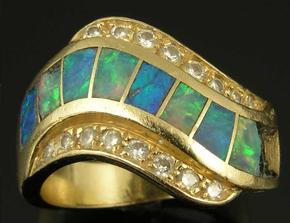 Australian opal inlay ring in need of repair.