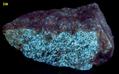 fluorescent DIOPSIDE, CHONDRODITE, Calcite, Pyrite, Long Lake Zinc Mine (Richardson Mine, Lynx Mine), Long Lake Village, Olden Township, Frontenac County, Ontario, Canada for sale