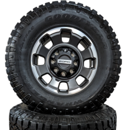 FORD 8 LUG 18 F-250 F-350 TREMOR MACHINED AND TARNISHED DARK ANODIZED LOW-GLOSS WHEELS WITH 35 GOODYEAR WRANGLER DURATRAC TIRES
