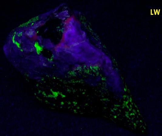 fluorescing Hardystonite, Willemite, Calcite, black Franklinite, brown Zn-Diopside Zinc Schefferite - Franklin Mine, Franklin, Franklin Mining District, Sussex County, New Jersey - type locality