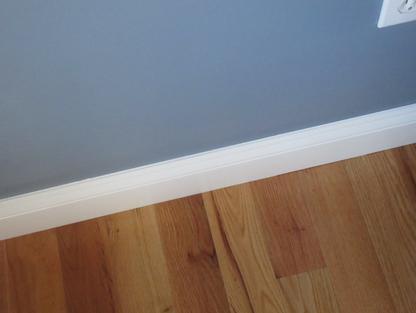 straight line painting on baseboard by Jcb Painting in Taunton, MA.