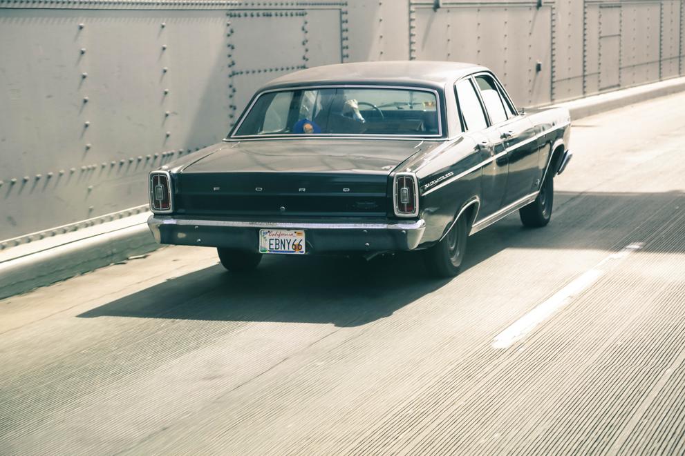 vintage car crossing bay bridge san francisco bay area