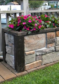 How to build an easy DIY stone veneer raised planter. FREE step by step instructions. www.DIYeasycrafts.com