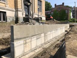 Close-up of exposed concrete retaining wall