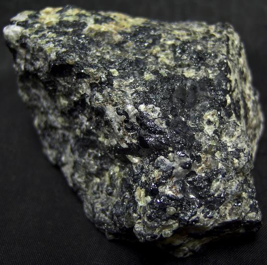 FRANKLINITE, fluorescing WILLEMITE, CALCITE - Sterling Mine, Sterling Hill, Ogdensburg, Franklin Mining District, Sussex County, New Jersey, USA - Franklinite type locality