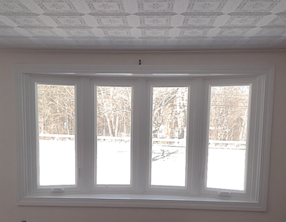 Newly painted with white semi-gloss, bay window in Dighton, MA..