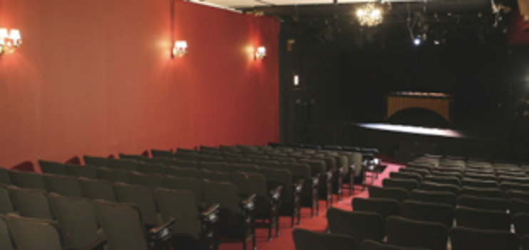 picture of Players Theatre stage with marimba on it.
