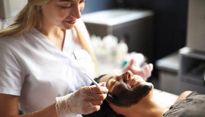 lady receiving a facial treatment