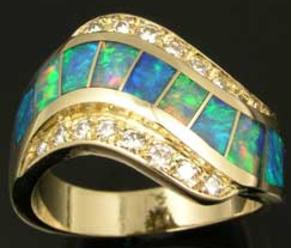 Repaired Australian opal inlay ring with diamonds.