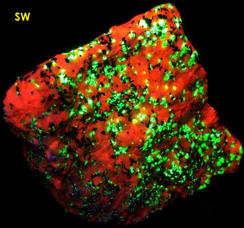 fluorescing Willemite, Hardystonite, Rhodonite, Franklinite, Calcite -Franklin Mine, Franklin, Franklin Mining District, Sussex County, New Jersey, USA