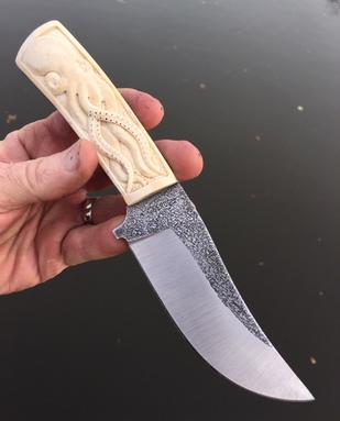 Custom AEBL stainless knife with hand carved Octopus in bone handles. www.Bergknifemaking.com
