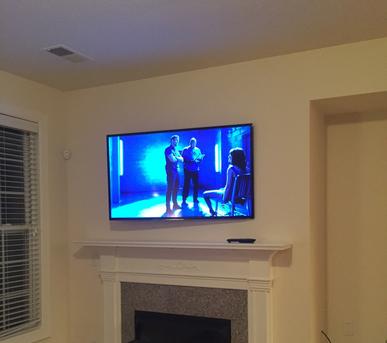 Flat Screen, plasma, lcd, 4k, curved tv mount installation over fireplace in Charlotte NC< Waxhaw, NC, Matthews, Pinevile, Fort Mill SC, Rock Hill and Indian Land SC