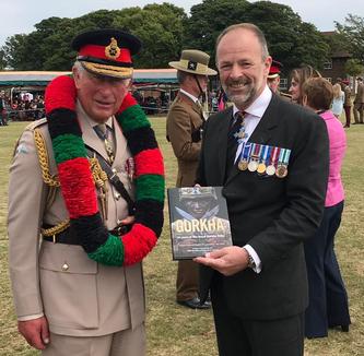 Prince Charles with Craig Lawrence at the Regimental Launch of the new Gurkha RGR25 book
