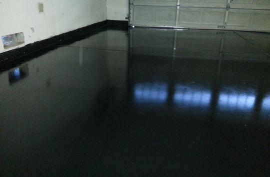 black epoxy polished garage floor