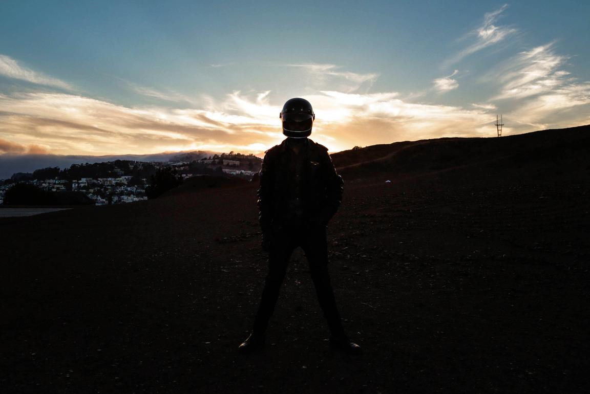 biker helmet sunset blue sky with sutro tower bay area