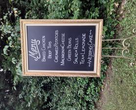 Gold vintage easel, 56" inches tall for rent at Rent Your Event, LLC. Great for holding chalkboards or bridal portraits.