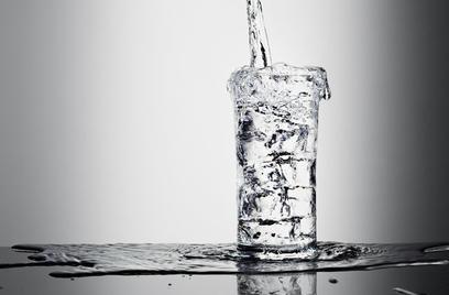 image of glass of water overflowing