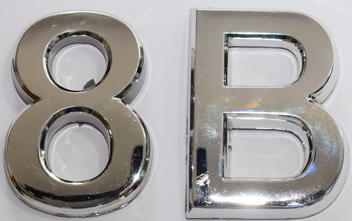 DOB SIGNS: 1 SIGN– SILVER (PLASTIC NUMBERS FOR MAIL BOXES IN NYC)