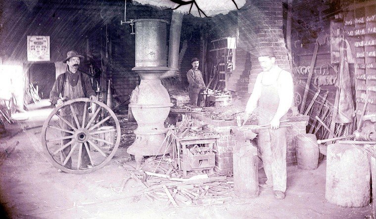 Men showing how Indy hammered knives are made